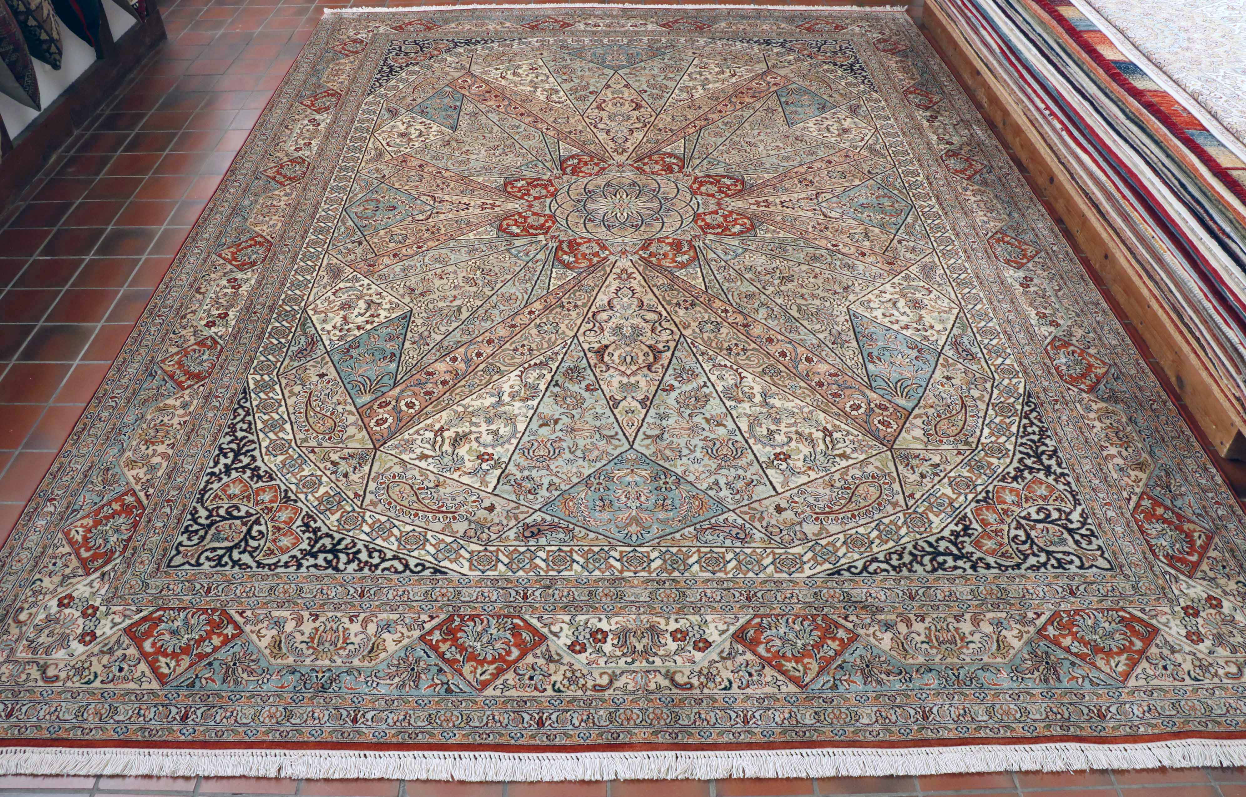 Wow! What a truly breathtaking piece of art! This Kashmir Silk is originally a Persian design that has been handmade in the mountainous region of Kashmir. The soft duck-egg blue is just one of many tantalising colours that are in this piece, such as terracotta, sky blue, and cream.